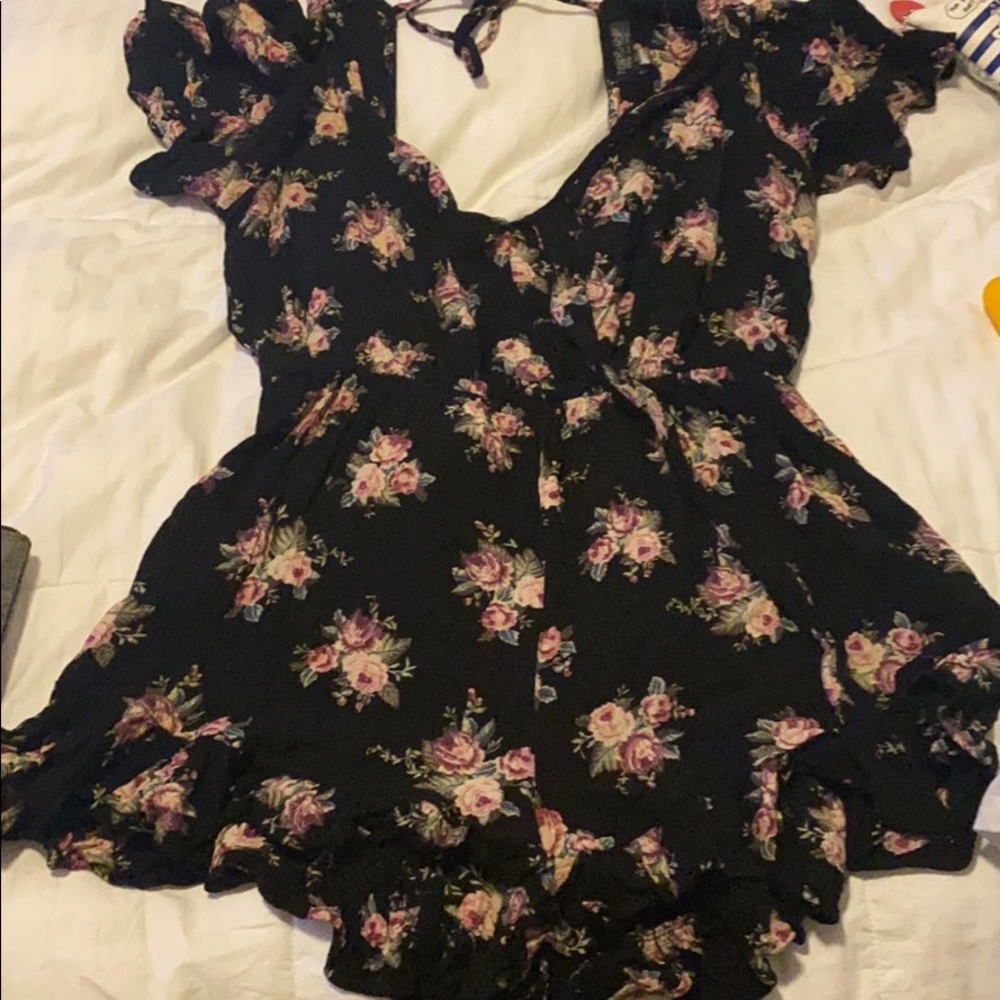 Black romper with floral print